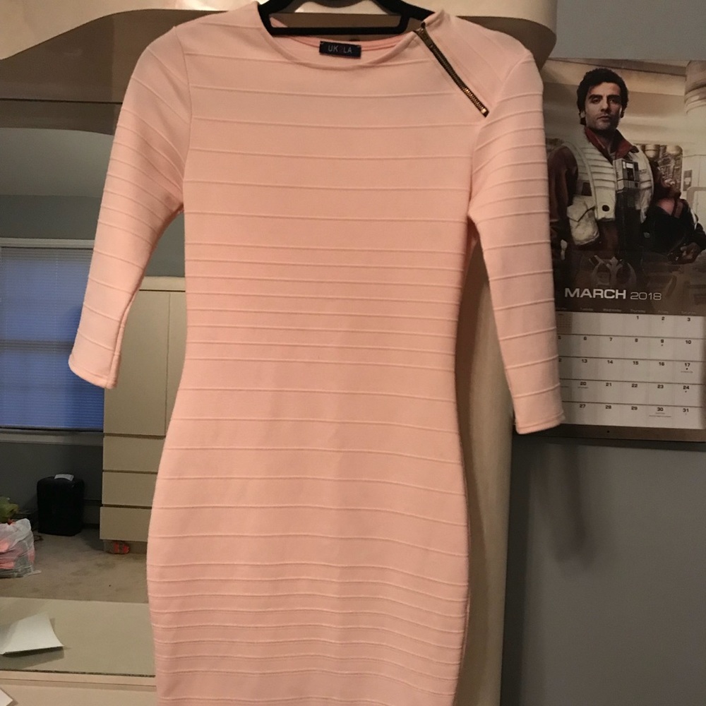 Pink knee length dress with sleeves